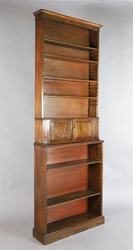 A Victorian slender mahogany open bookcase, W.2ft 6in. D.8.5in. H.7ft